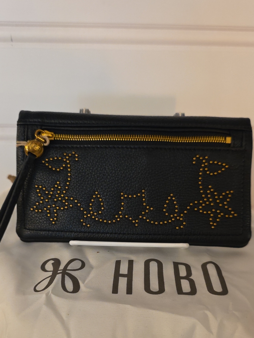 HOBO Lumen Continental Black Leather Wallet with Gold Stud Floral Accent